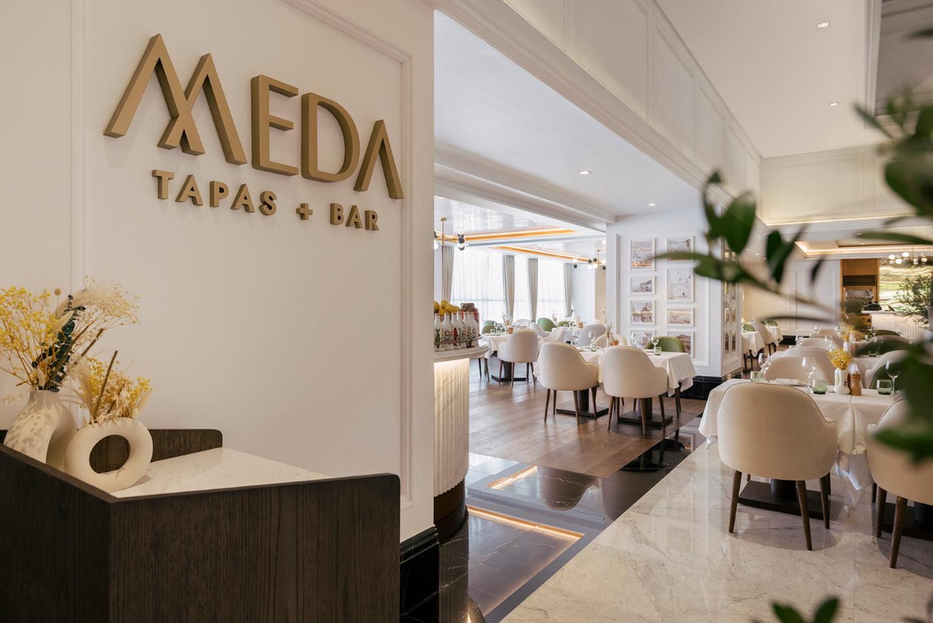 Hotel Taj Dubaï Extérieur photo MEDA Tapas & Bar