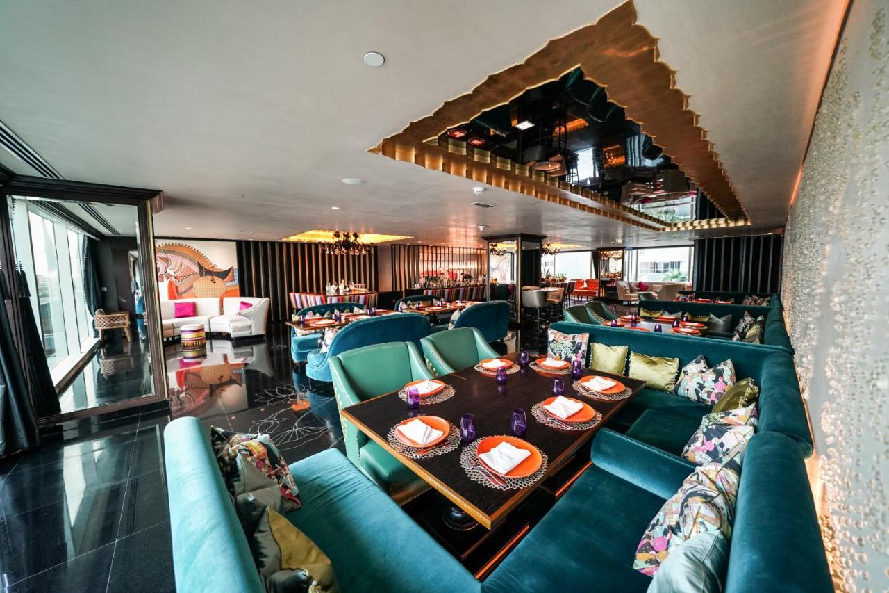Hotel Taj Dubaï Extérieur photo The interior of the restaurant